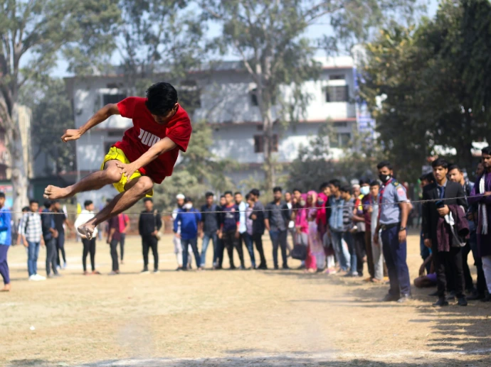 a man flying through the air while riding a skateboard